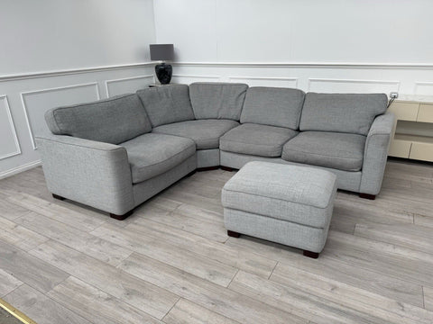 FURNITURE VILLAGE Elora Curved Corner Sofa Grey Fabric + Storage Footstool0